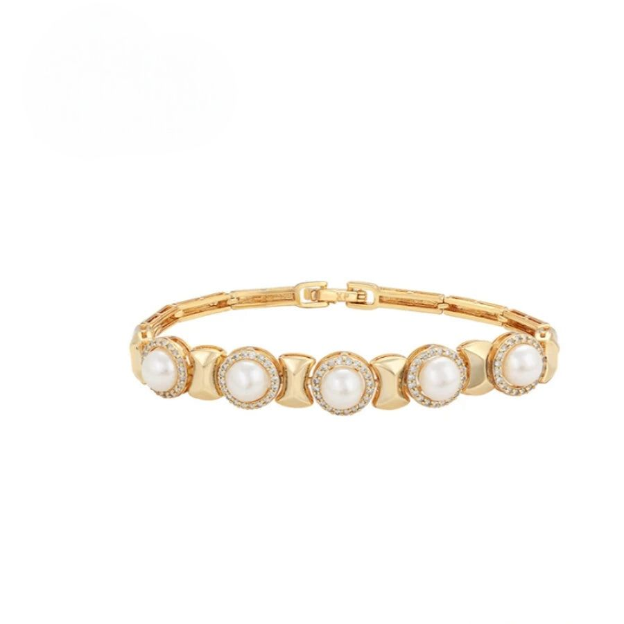 BRACELET EN PLAQUÉ OR
POUR FEMME